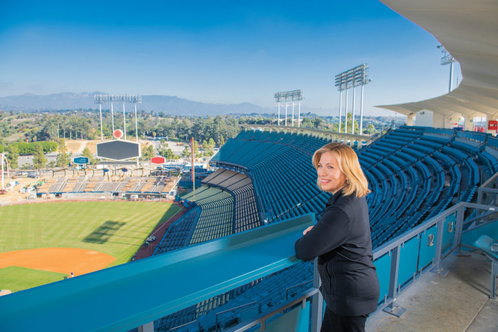 Cathy Lara overlooking the Dodger Stadium from top row seats.