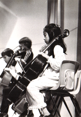 Ten-year-old Lacanlale playing the cello