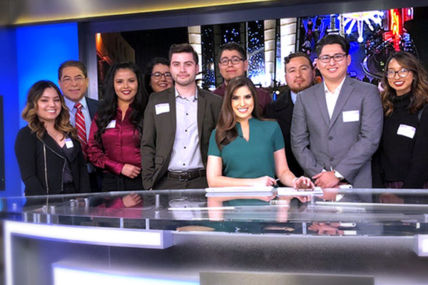 Students with news anchor at Telemundo.