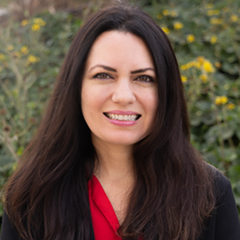 Person with long dark hair.