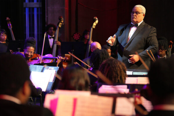 Conductor leading orchestra