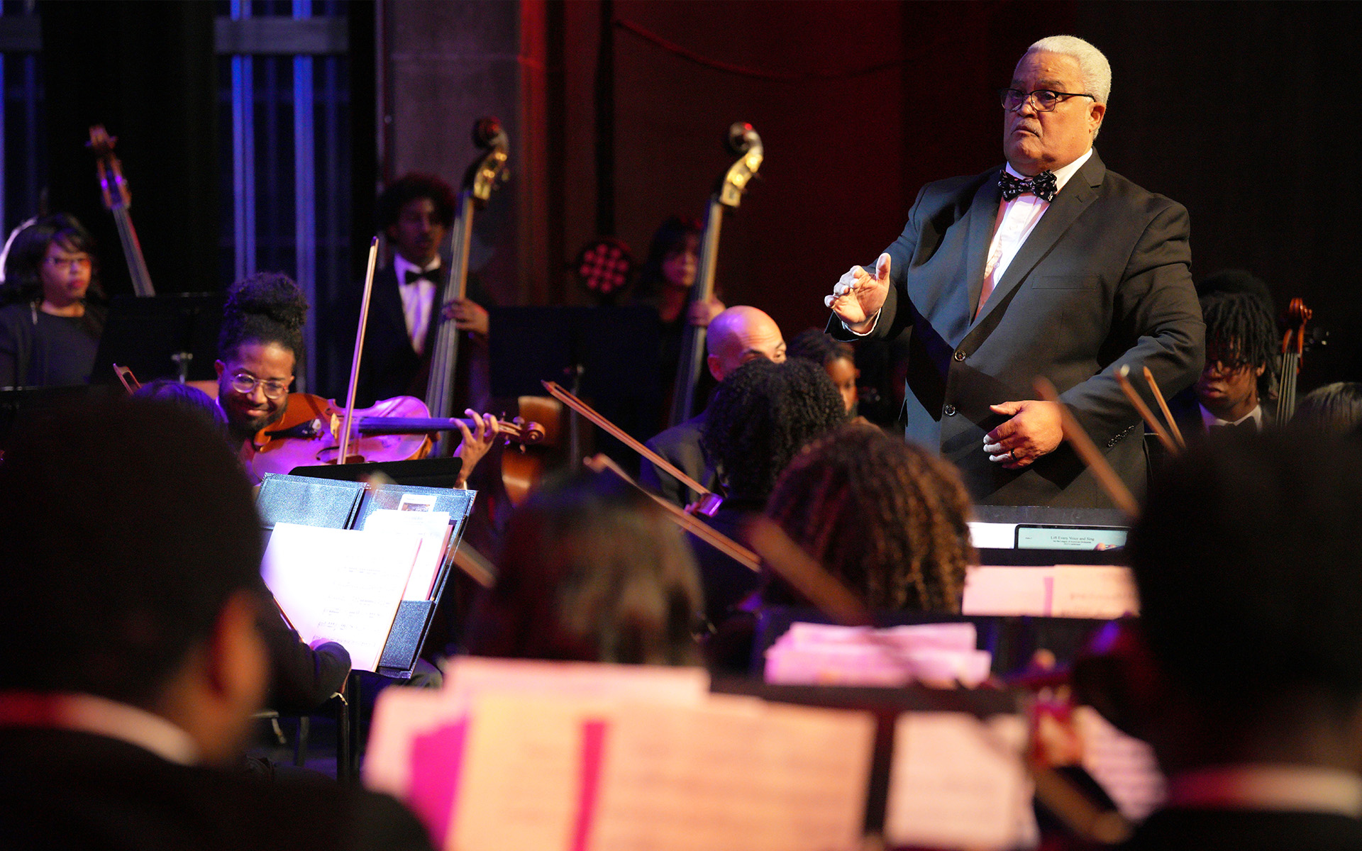 Conductor leading orchestra